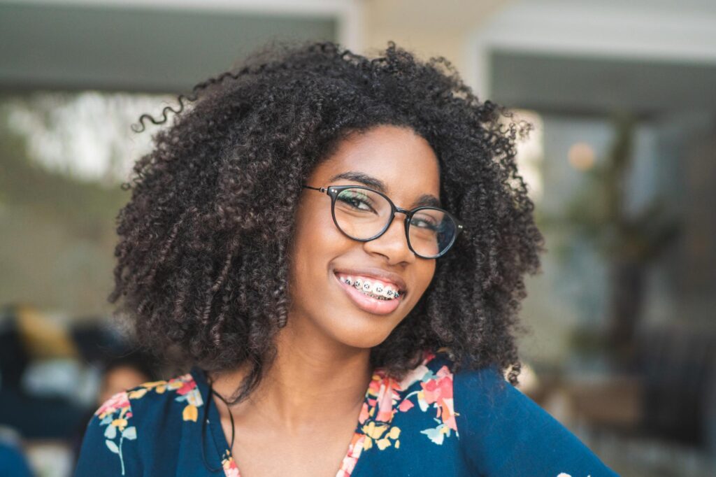 Young Woman smiling with her new Albany Braces