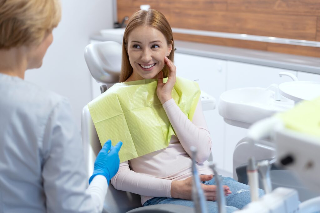 Smiling patient starting an orthodontic consultation in the Capital Region