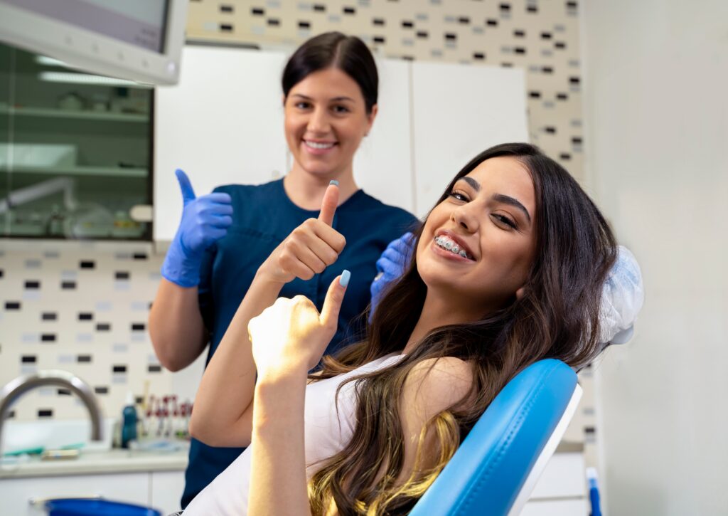Smiling orthodontic patient ready to start braces or Invisalign treatment at Adirondack Orthodontics